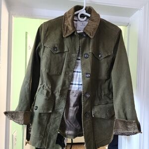 WoolRich men's forest green three-quarters coat.